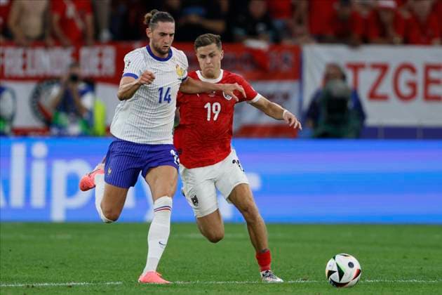 Austria v France: Group D - UEFA EURO, EM, Europameisterschaft,Fussball 2024 Christoph Baumgartner of Austria and Adrien Rabiot of France challenge during the UEFA EURO 2024 group stage match between Austria and France at Düsseldorf Arena on June 17, 2024 in Dusseldorf, Germany. Düsseldorf Düsseldorf Arena Germany Germany Copyright: xRichardxSellers Sportsphoto APLx 14041135