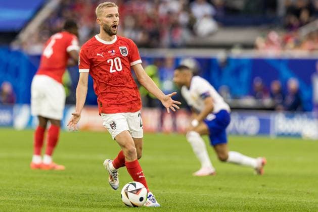 17th June 2024; Dusseldorf Arena, Dusseldorf, Germany; Euro 2024 Group D Football, Austria versus France; Konrad Laimer (AUT) stops his run as the referee whistles for a foul  ActionPlus12656086 TomaszxJastrzebowski