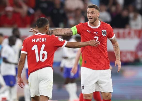 Dusseldorf, Germany, 17th June 2024. Marko Arnautovic of Austria disagrees with Phillipp Mwene of Austria during the UEFA European Championships match at Dusseldorf Arena, Dusseldorf. Picture credit should read: David Klein Sportimage EDITORIAL USE ONLY. No use with unauthorised audio, video, data, fixture lists, club league logos or live services. Online in-match use limited to 120 images, no video emulation. No use in betting, games or single club league player publications. SPI-3197-0079
