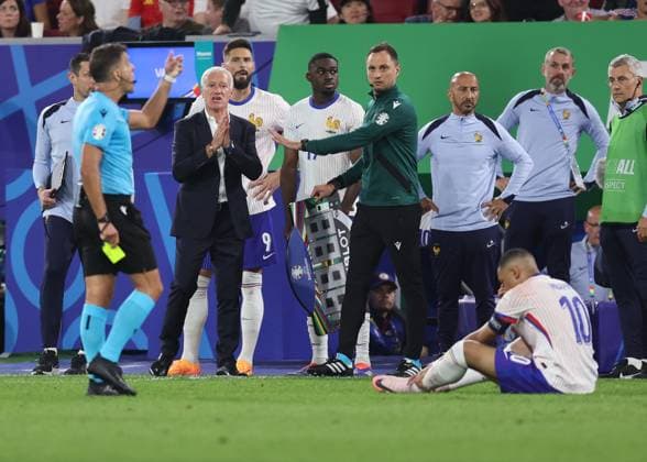 Dusseldorf, Germany, 17th June 2024. Referee Jesus Gill Manzano waits to give a yellow card to Kylan Mbappe of France during the UEFA European Championships match at Dusseldorf Arena, Dusseldorf. Picture credit should read: David Klein Sportimage EDITORIAL USE ONLY. No use with unauthorised audio, video, data, fixture lists, club league logos or live services. Online in-match use limited to 120 images, no video emulation. No use in betting, games or single club league player publications. SPI-3197-0090