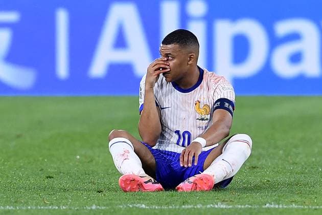 Soccer UEFA EURO 2024 Group Stage 1 Matchday Austria France on 17 06 2024 at Düsseldorf Arena in Düsseldorf Kylian Mbappe France injured on the ground Injury xRx