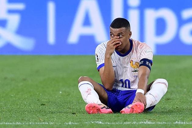 Soccer UEFA EURO 2024 Group Stage 1 Matchday Austria France on 17 06 2024 at Düsseldorf Arena in Düsseldorf Kylian Mbappe France injured on the ground Injury xRx