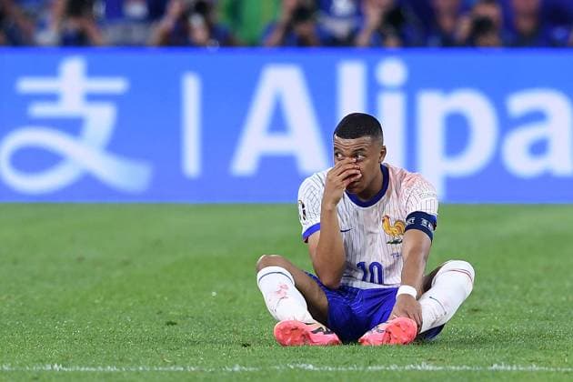 Soccer UEFA EURO 2024 Group Stage 1 Matchday Austria France on 17 06 2024 at Düsseldorf Arena in Düsseldorf Kylian Mbappe France injured on the ground Injury xRx