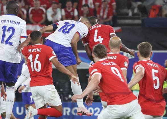 Dusseldorf, Germany, 17th June 2024. Kylan Mbappe of France heads the shoulder of Kevin Danso of Austria to cause his broken nose during the UEFA European Championships match at Dusseldorf Arena, Dusseldorf. Picture credit should read: David Klein Sportimage EDITORIAL USE ONLY. No use with unauthorised audio, video, data, fixture lists, club league logos or live services. Online in-match use limited to 120 images, no video emulation. No use in betting, games or single club league player publications. SPI-3197-0098