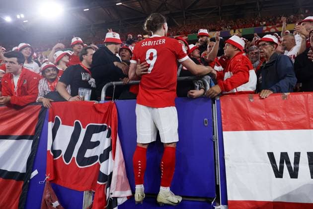 Marcel Sabitzer of Austria goes into the crowd to speak with Austria fans Austria v France, UEFA European Championship, EM, Europameisterschaft 2024, Group D, Football, Dusseldorf Arena, Dusseldorf, Germany, 17 Jun 2024 EDITORIAL USE ONLY No use with unauthorised audio, video, data, fixture lists, club league logos or live services. Online in-match use limited to 120 images, no video emulation. No use in betting, games or single club league player publications. Copyright: xKieranxMcManus Shutterstockx 14539693bw