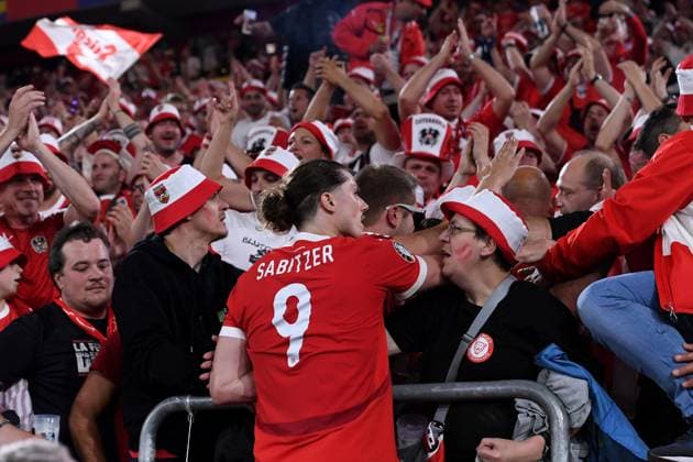 Soccer UEFA EURO 2024 Group Stage 1 Matchday Austria France on 17 06 2024 at Düsseldorf Arena in Düsseldorf Marcel Sabitzer Austria with the fans Spectators Block Austria xRx