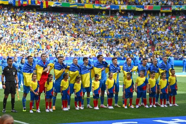 Team photo,Team,Team,Team photo Ukraine with flags,Flags, Group stage Group C Romania ROU Ukraine UKR 3 0, on 17 06 2024 Football Arena Munich, Football UEFA EURO 2024 GERMANY from 14 06 2024 14 07 2024