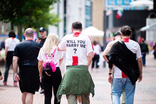 18 06 2024 Football, European Championship 2024 in Germany, fans in Dortmund Turkey Georgia Georgian fans at noon before the match in the city center with the inscription on the T-shirt Will you marry me