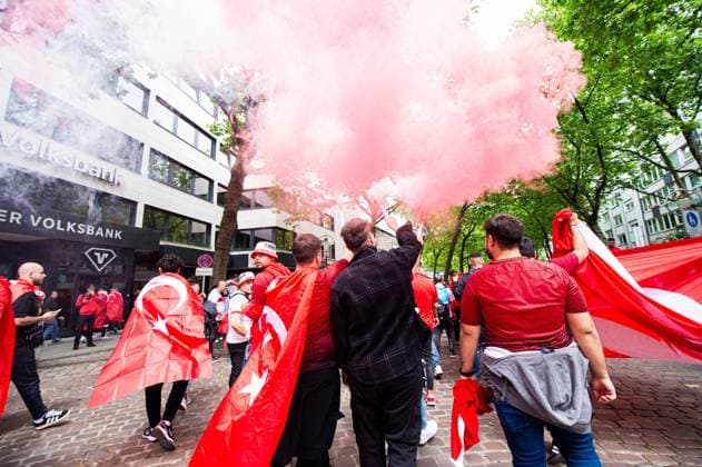 18 06 2024 Football, European Championship 2024 in Germany, fans in Dortmund Turkey Georgia Turkish fans with pyrotechnics in the city center at noon before the match