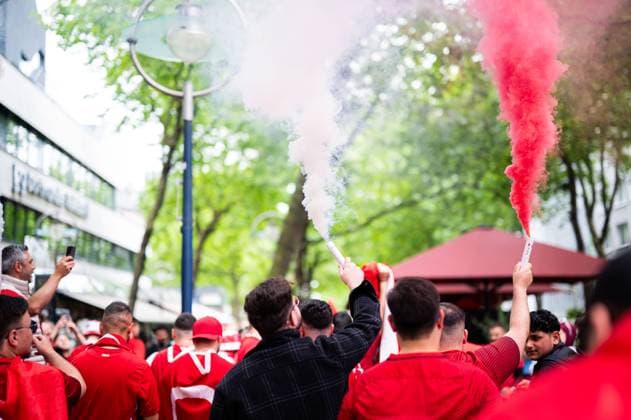 18 06 2024 Football, European Championship 2024 in Germany, fans in Dortmund Turkey Georgia Turkish fans with pyrotechnics in the city center at noon before the match