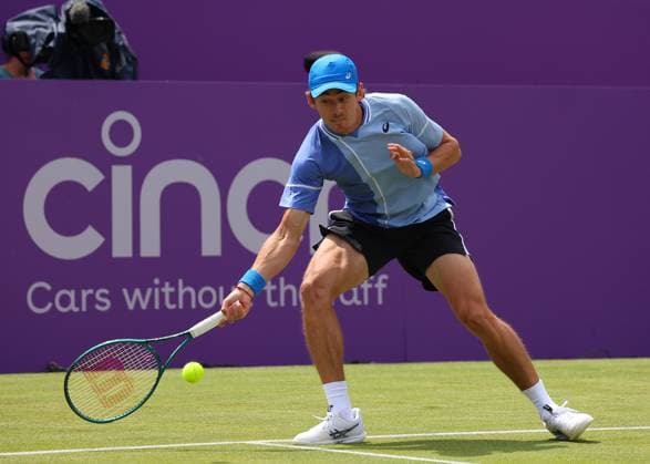 18th June 2024; Cinch Championships, Queens Club, West Kensington, London, England: Cinch Championships Queens Club, Day 2; Alex DE MINAUR (AUS) with a forehand shot to Lorenzo MUSETTI (ITA), mens singles match  ActionPlus12656189 JohnxPatrickxFletcher