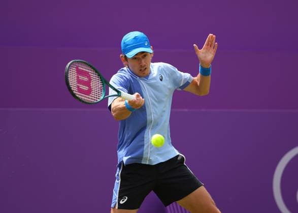18th June 2024; Cinch Championships, Queens Club, West Kensington, London, England: Cinch Championships Queens Club, Day 2; Alex DE MINAUR (AUS) with a forehand shot to Lorenzo MUSETTI (ITA), mens singles match  ActionPlus12656190 JohnxPatrickxFletcher