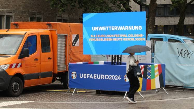 On a digital information board, the city of Cologne announces that the Euro 2024 fan festival will remain closed on Tuesday due to a storm warning Cologne North Rhine-Westphalia