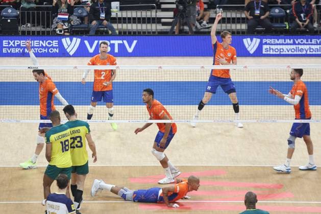 PH: Brazil Outlasts Netherlands in Four Sets during VNL 2024 Match Netherlands Orange celebrate after netting a point over Brasil Yellow during their VNL match. Pasay City Metro Manila Philippines Copyright: DennisxJeromexAcosta
