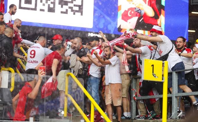 Trouble breaks out between fans in the stands ahead of kick off Turkiye v Georgia, UEFA European Championship, EM, Europameisterschaft 2024, Group F, Football, BVB Stadion, Dortmund, Germany, 18 Jun 2024 EDITORIAL USE ONLY No use with unauthorised audio, video, data, fixture lists, club league logos or live services. Online in-match use limited to 120 images, no video emulation. No use in betting, games or single club league player publications. Copyright: xPaulxCurrie Shutterstockx 14543470aq