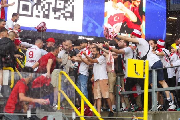Trouble breaks out between fans in the stands ahead of kick off Turkiye v Georgia, UEFA European Championship, EM, Europameisterschaft 2024, Group F, Football, BVB Stadion, Dortmund, Germany, 18 Jun 2024 EDITORIAL USE ONLY No use with unauthorised audio, video, data, fixture lists, club league logos or live services. Online in-match use limited to 120 images, no video emulation. No use in betting, games or single club league player publications. Copyright: xPaulxCurrie Shutterstockx 14543470ar