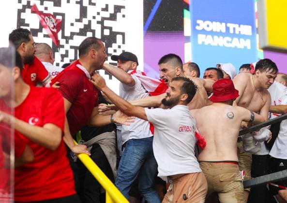 Trouble breaks out between fans in the stands ahead of kick off Turkiye v Georgia, UEFA European Championship, EM, Europameisterschaft 2024, Group F, Football, BVB Stadion, Dortmund, Germany, 18 Jun 2024 EDITORIAL USE ONLY No use with unauthorised audio, video, data, fixture lists, club league logos or live services. Online in-match use limited to 120 images, no video emulation. No use in betting, games or single club league player publications. Copyright: xPaulxCurrie Shutterstockx 14543470ao