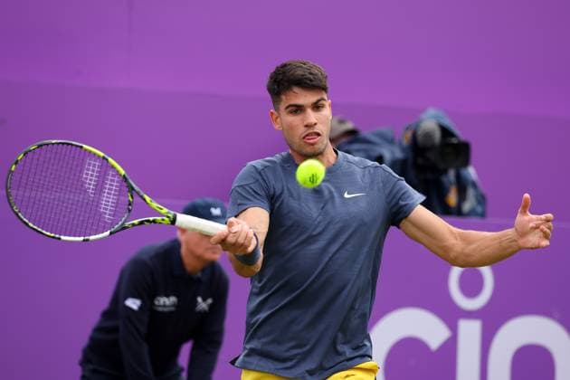 18th June 2024; Cinch Championships, Queens Club, West Kensington, London, England: Cinch Championships Queens Club, Day 2; Carlos Alcaraz (ESP) with a forehand shot to Francisco Cerundolo (ARG), mens singles match  ActionPlus12656350 JohnxPatrickxFletcher
