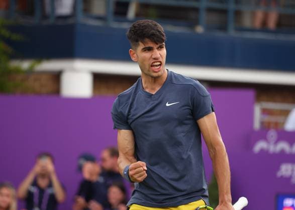 18th June 2024; Cinch Championships, Queens Club, West Kensington, London, England: Cinch Championships Queens Club, Day 2; Carlos Alcaraz (ESP) celebrates after defeating Francisco Cerundolo (ARG) by two sets to reach the next round, mens singles match  ActionPlus12656375 JohnxPatrickxFletcher