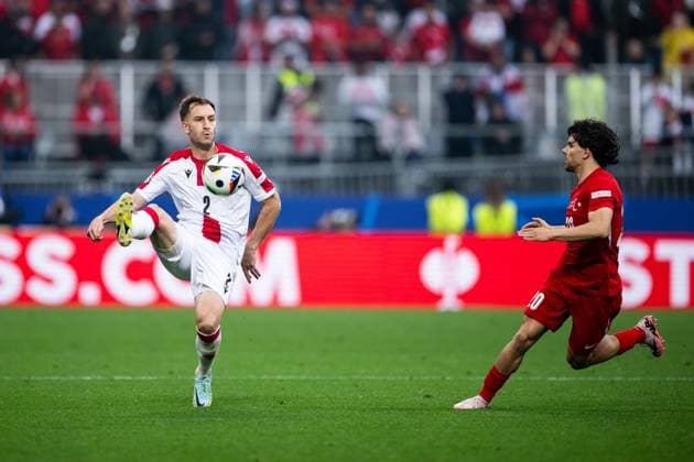 240618 Otar Kakabadze of Georgia and Ferdi Kadiouglu of Türkiye during the UEFA Euro 2024 Football Championship match between Türkiye and Georgia on June 18, 2024 in Dortmund Photo Jesper Zerman BILDBYRAN kod JZ JZ0541 fotboll football soccer fotballs em europamästerskap em uefa euro uefa european football championship euro 2024 türkiye georgien georgia bbeng turkiet turkey  Copyright: JESPERxZERMAN BB240618JZ051