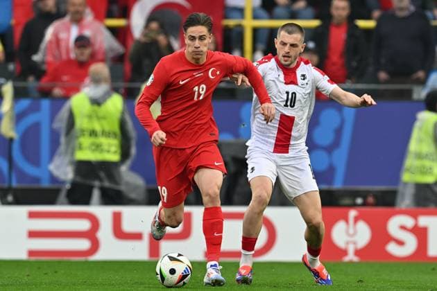 240618 EURO2024 TURKEY VS GEORGIA Kenan Yildiz (19) of Turkey fighting for the ball with Giorgi Chakvetadze (10) of Georgia during a soccer game between the national teams of Turkey and Georgia on the first matchday in Group F in the group stage of the UEFA EURO, EM, Europameisterschaft,Fussball 2024 tournament , on Tuesday 18 June 2024 in Dortmund , Germany . PHOTO SPORTPIX David Catry DORTMUND GERMANY  Copyright: xx 464479