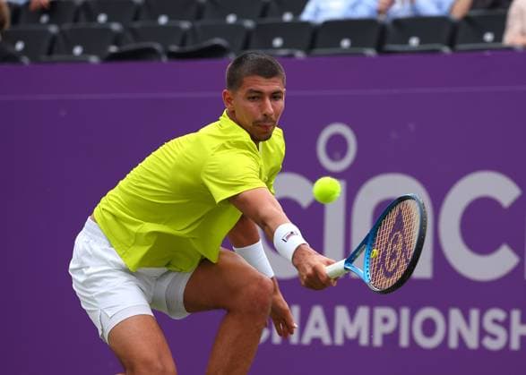 18th June 2024; Cinch Championships, Queens Club, West Kensington, London, England: Cinch Championships Queens Club, Day 2; Alexei Papyrin (AUS) with a backhand shot to Andy Murray (GBR), mens singles match  ActionPlus12656470 JohnxPatrickxFletcher