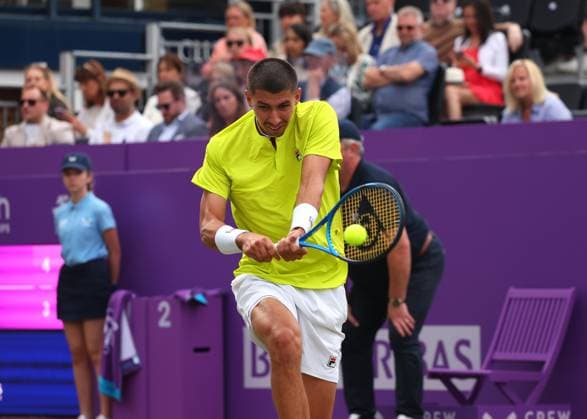 18th June 2024; Cinch Championships, Queens Club, West Kensington, London, England: Cinch Championships Queens Club, Day 2; Alexei Papyrin (AUS) with a backhand shot to Andy Murray (GBR), mens singles match  ActionPlus12656472 JohnxPatrickxFletcher