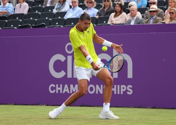18th June 2024; Cinch Championships, Queens Club, West Kensington, London, England: Cinch Championships Queens Club, Day 2; Alexei Papyrin (AUS) with a backhand shot to Andy Murray (GBR), mens singles match  ActionPlus12656476 JohnxPatrickxFletcher