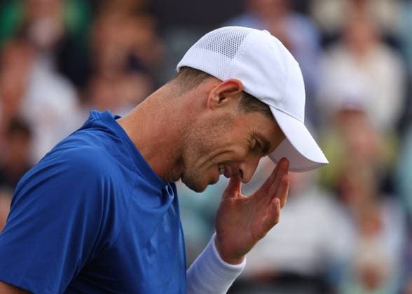 18th June 2024; Cinch Championships, Queens Club, West Kensington, London, England: Cinch Championships Queens Club, Day 2; Spectators waving the flag of Scotland for Andy Murray (GBR) reacts after losing a point to Alexei Papyrin (AUS), mens singles match  ActionPlus12656461 JohnxPatrickxFletcher