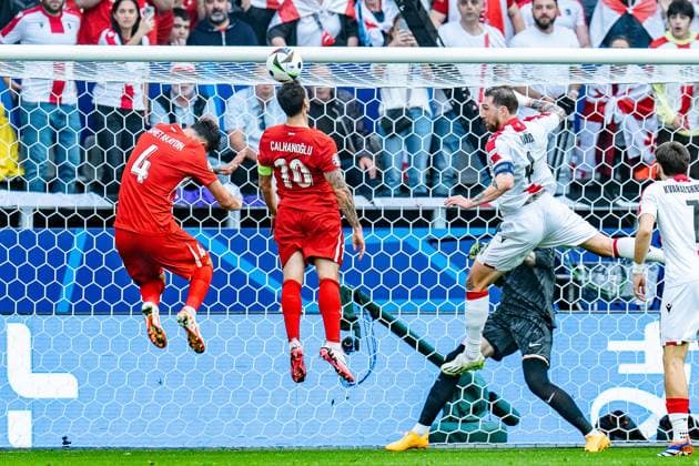 Hakan Calhanoglu Turkey, 10 Samet Akaydin Turkey, 4 Guram Kashia Georgia, 4 Turkey vs Georgia, Men, Football, 1 Matchday, EURO 2024, 18 06 2024, European Championship, Group F Turkey vs Georgia, Men, Football, 1 Matchday, EURO 2024, 18 06 2024, European Championship, Group F Dortmund Copyright: xEibner-Pressefoto BahhoxKarax EP_TUR