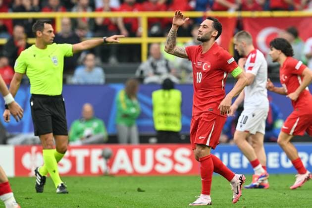 240618 EURO2024 TURKEY VS GEORGIA Hakan calhanoglu (10) of Turkey reacts during a soccer game between the national teams of Turkey and Georgia on the first matchday in Group F in the group stage of the UEFA EURO, EM, Europameisterschaft,Fussball 2024 tournament , on Tuesday 18 June 2024 in Dortmund , Germany . PHOTO SPORTPIX David Catry DORTMUND GERMANY  Copyright: xx 464519