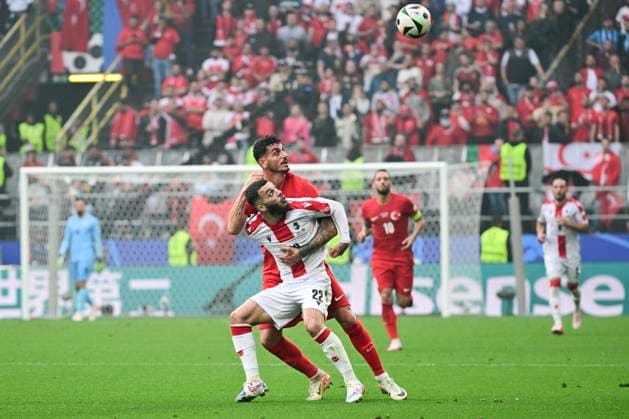 Georges Mikautadze 22 Georgia in duel, action, with Samet Akaydin 4 Turkey , Turkey vs Georgia, Football, UEFA Euro 2024, Group stage, Matchday 1, 18 06 2024 Dortmund Nordrhein Westfalen Germany Copyright: xkolbert-press MarcxNiemeyerx
