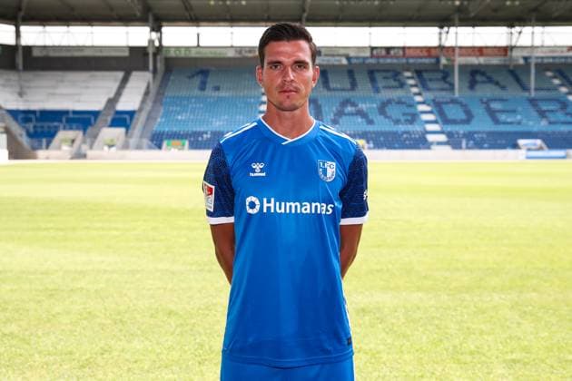 Tobias Müller 1 FC Magdeburg,5 2 Soccer Bundesliga Season 2024 2025 Photo session 1 FC Magdeburg with new additions and team in the new home jersey in the AVNET Arena in Magdeburg Soccer,Man,Men,Germany,18 06 2024