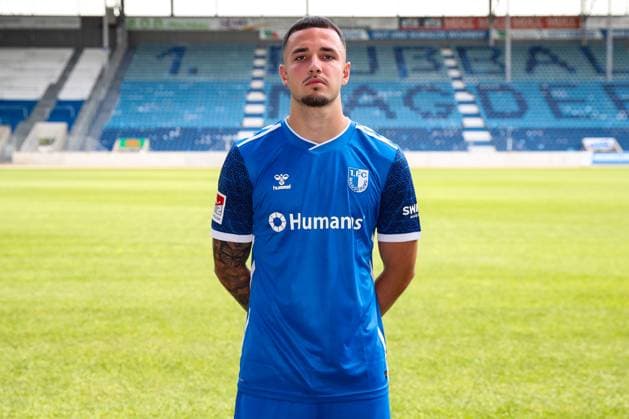 Falko Michel 1 FC Magdeburg,21 2 Soccer Bundesliga Season 2024 2025 Photo session 1 FC Magdeburg with new additions and team in the new home jersey in the AVNET Arena in Magdeburg Soccer,Man,Men,Germany,18 06 2024