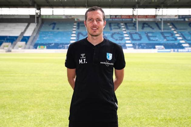 Goalkeeping coach Matthias Tischer 1 FC Magdeburg 2 Soccer Bundesliga season 2024 2025 Photo session 1 FC Magdeburg with new additions and team in the new home jersey at the AVNET Arena in Magdeburg Soccer,Man,Men,Germany,18 06 2024