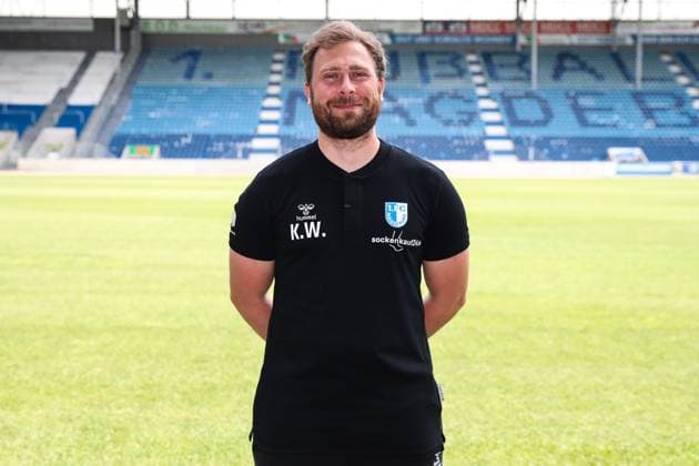 Videoanalyst Kevin Waliczek 1 FC Magdeburg 2 Soccer Bundesliga Season 2024 2025 Photo session 1 FC Magdeburg with new additions and team in the new home jersey at the AVNET Arena in Magdeburg Soccer,Man,Men,Germany,18 06 2024