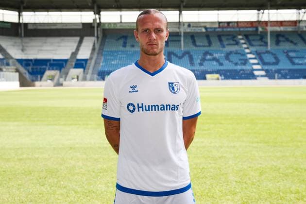 Goalkeeper Dominik Reimann 1 FC Magdeburg,1 2 Soccer Bundesliga Season 2024 2025 Photo session 1 FC Magdeburg with new additions and team in the new home jersey at the AVNET Arena in Magdeburg Soccer,Man,Men,Germany,18 06 2024