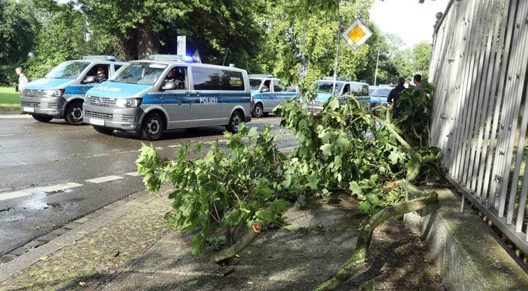 Police escort the fan march of the Czech fans, branches from the storm lie on the road Sport Football Soccer European Championship Euro 2024 European Championship Men Season 2023 2024 18 06 2024 Portugal POR vs Czech Republic CZE in Leipzig DFL regulations prohibit any use of photographs as image sequences and or quasi video
