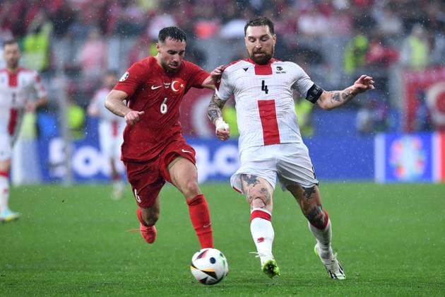 Soccer UEFA EURO 2024 Group Stage 1 Matchday Turkey Georgia on 18 06 2024 at BVB Stadion Dortmund in Dortmund Orkun Kökcü Turkey , left Guram Kashia Georgia , right xRx