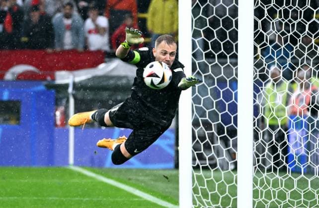 Football, European Championship, EURO 2024, Group F, Signal Iduna Park Dortmund Turkey Georgia 3 1 Mert Günok TUR is lucky, the ball hits the post just before the end