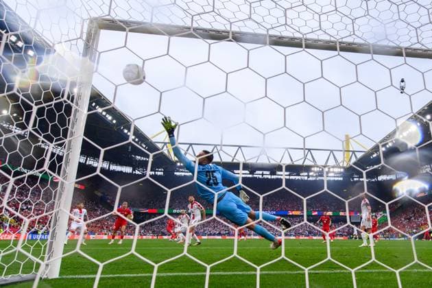 240618 Giorgi Mamardashvili of Georgia lets in 1 0 by Mert Muldur of Türkiye during the UEFA Euro 2024 Football Championship match between Türkiye and Georgia on June 18, 2024 in Dortmund Photo Jesper Zerman BILDBYRAN kod JZ JZ0541 fotboll football soccer fotballs em europamästskap em uefa euro uefa european football championship euro 2024 türkiye georgien georgia bbeng turkiet turkey  Copyright: JESPERxZERMAN BB240618JZ134