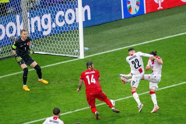 GER, EURO 2024, Group F, Turkey Tur vs Georgia GEO 18 06 2024, BVB Stadium Dortmund, Dortmund, GER, EURO 2024, Group F, Turkey Tur vs Georgia GEO In the picture Georges Mikautadze Georgia GEO, 22 andGiorgi Kochorashvili Georgia GEO, 06 obstruct each other and Abduelkerim Bardakci Turkey TURKEY, 14 can clarify nordphotoxGmbHxx xDenkinger nph00015