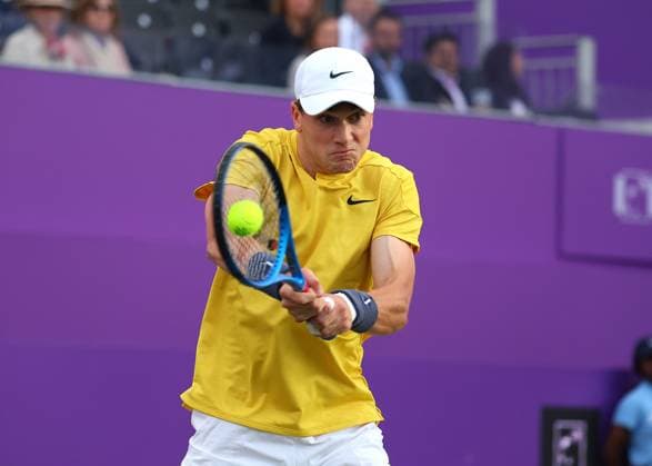 18th June 2024; Cinch Championships, Queens Club, West Kensington, London, England: Cinch Championships Queens Club, Day 2; Jack Draper (GBR) with a backhand shot to Mariano Navone (ARG), mens singles match  ActionPlus12656648 JohnxPatrickxFletcher