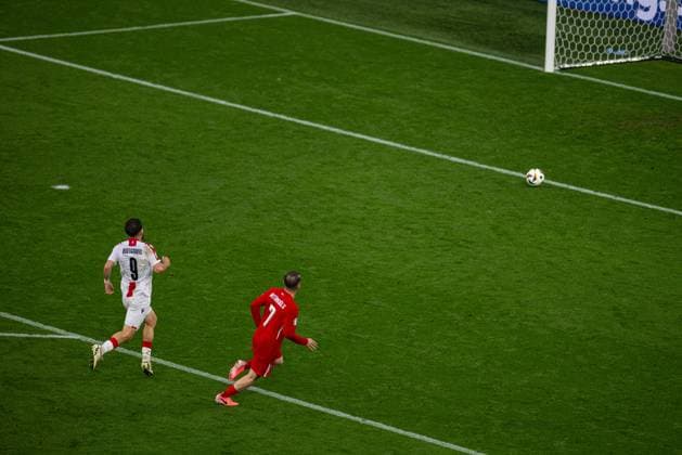 Football - UEFA EURO, EM, Europameisterschaft,Fussball 2024 - Group F - Turkey v Georgia DORTMUND, GERMANY - Tuesday, June 18, 2024: Turkey s Kerem AktürkoÄülu hits the ball into an empty net to score his side s third goal, in injury time, during the UEFA Euro 2024 Group F match between Turkey and Georgia at the Westfalenstadion. Turkey won 3-1. (Photo by David Rawcliffe Propaganda) DORTMUND Westfalenstadion NORTH RHINE-WESTPHALIA GERMANY  Copyright: xDavidxRawcliffex P2024-06-18-Turkey_Georgia-99