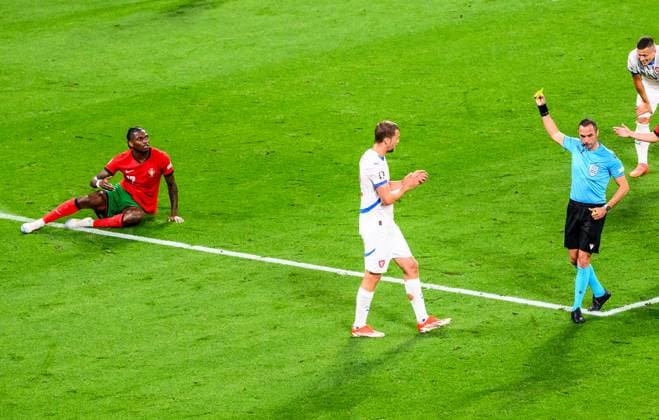 From left Rafael Leao of Portugal and Czech Tomas Soucek receives yellow card during the Czech Republic vs. Portugal match within the European Football Championships, Leipzig, Germany, June 18, 2024. (CTKxPhoto OndrejxHajek) CTKPhotoP2024061809043  CTKPhotoP2024061809043