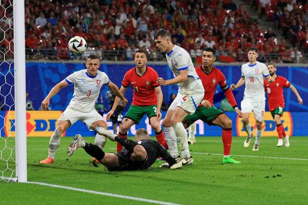 Robin Hranac of Czechia scores an own goal to make it 1-1 after Jindrich Stanek of Czechia pushes the ball into their path Portugal v Czechia, UEFA European Championship, EM, Europameisterschaft 2024, Group F, Football, Leipzig Stadium, Leipzig, Germany, 18 Jun 2024 EDITORIAL USE ONLY No use with unauthorised audio, video, data, fixture lists, club league logos or live services. Online in-match use limited to 120 images, no video emulation. No use in betting, games or single club league player publications.  Copyright: xMattxWest Shutterstockx 14543474by