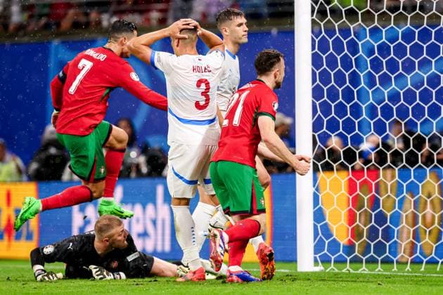 2024-06-18 Portugal v Czechia - Group F - UEFA EURO, EM, Europameisterschaft,Fussball 2024 LEIPZIG, GERMANY - JUNE 18: Tomas Holes of Czechia looks dejected over own goal of Robin Hranac of Czechia, Diogo Jota of Portugal and Cristiano Ronaldo of Portugal celebrating goal, Goalkeeper Jindrich Stanek of Czechia during the Group F - UEFA EURO 2024 match between Portugal and Czechia at Red Bull Arena on June 18, 2024 in Leipzig, Germany. (Photo by Peter Lous BSR Agency) Leipzig Germany Content not available for redistribution in The Netherlands directly or indirectly through any third parties. Copyright: xBSRxAgencyx