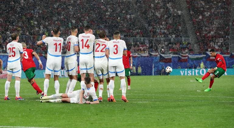 Cristiano Ronaldo shoots free kick over the wall Sport Football Soccer European Championship Euro 2024 European Championship Men Season 2023 2024 18 06 2024 Portugal POR vs Czech Republic CZE in Leipzig DFL regulations prohibit any use of photographs as image sequences and or quasi video