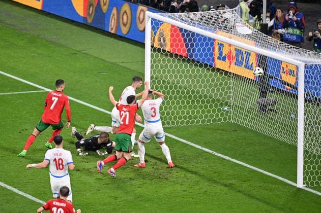 From left Cristiano Ronaldo of Portugal, Czech Ladislav Krejci, Czech goalie Jindrich Stanek, Czech Robin Hranac, Diogo Jota of Portugal, Czech Tomas Holes in action during the Czech Republic vs. Portugal match within the European Football Championships, Leipzig, Germany, June 18, 2024. (CTKxPhoto OndrejxHajek) CTKPhotoP2024061809344  CTKPhotoP2024061809344