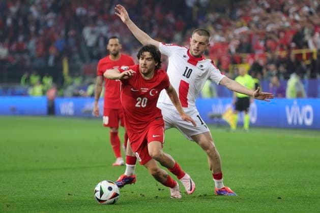 Turkey v Georgia UEFA EURO, EM, Europameisterschaft,Fussball 2024 Group F Ferdi KadÄ±oÄülu of Turkey and Giorgi Chakvetadze of Georgia in action during the UEFA Euro 2024 Group F match between Turkey and Georgia at Signal Iduna Park, Dortmund Copyright: xPaulxChestertonx FIL-20283-0254 UK Newspapers OUT